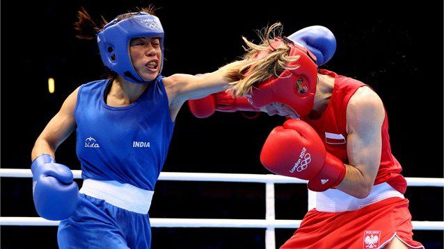 Five-time world champion M C Mary Kom assured of a medal on debut at the Commonwealth Games by advancing to the semifinals in women's 48 kg category