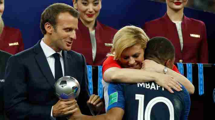 President Kolinda hugging Kylian Mbappe. Credits: AFP