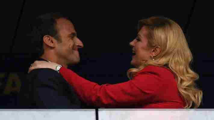 Croatian President Kolinda Grabar hugging French President Emmanuel Macron Credits: AFP